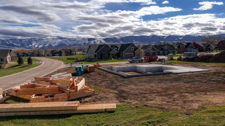 New Home Building in Wyoming With Foundation Being Laid in Ground 