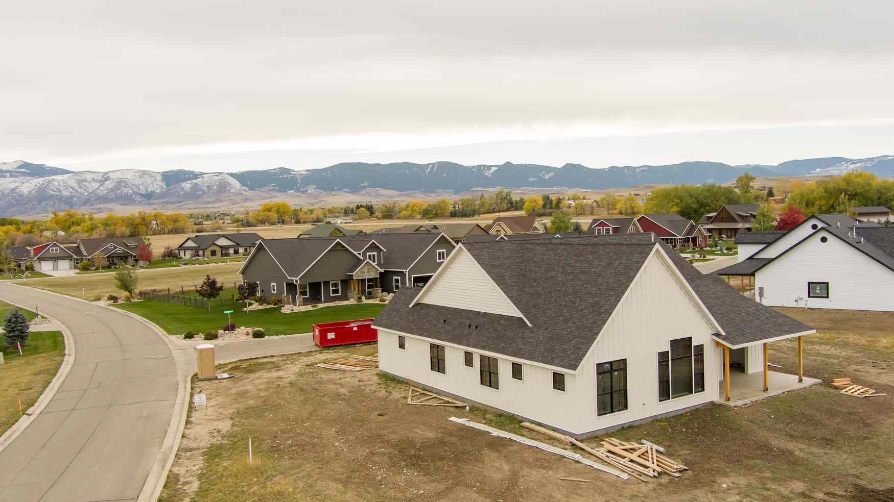 Outside Drone View of Custom Home Being Completed in Wyoming Neighborhood
