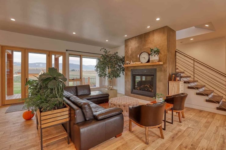Open concept living area with views of mountains and indoor raised garden bed