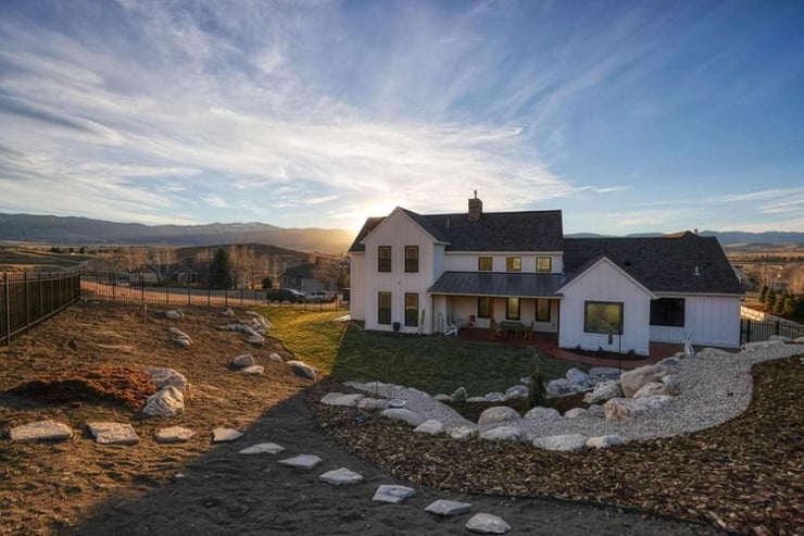 custom home exterior with sunset in background 91 powder horn wyoming-1