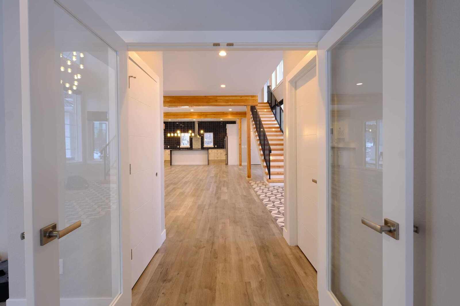 Door Opening Inside to Open-Concept Custom Home
