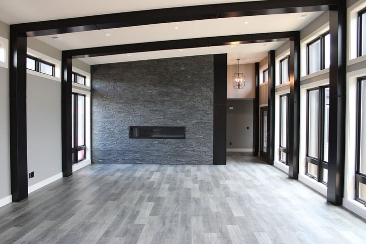 Main floor of luxury custom home in Sheridan, Wyoming with luxury vinyl gray flooring