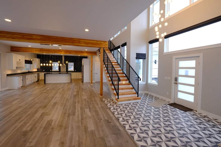 custom home build with wood beam ceiling open floor plan in wyoming