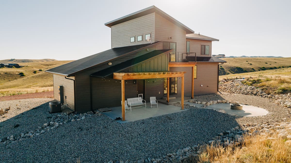 Custom wood pergola on Sheridan, WY custom home by First Choice Builders