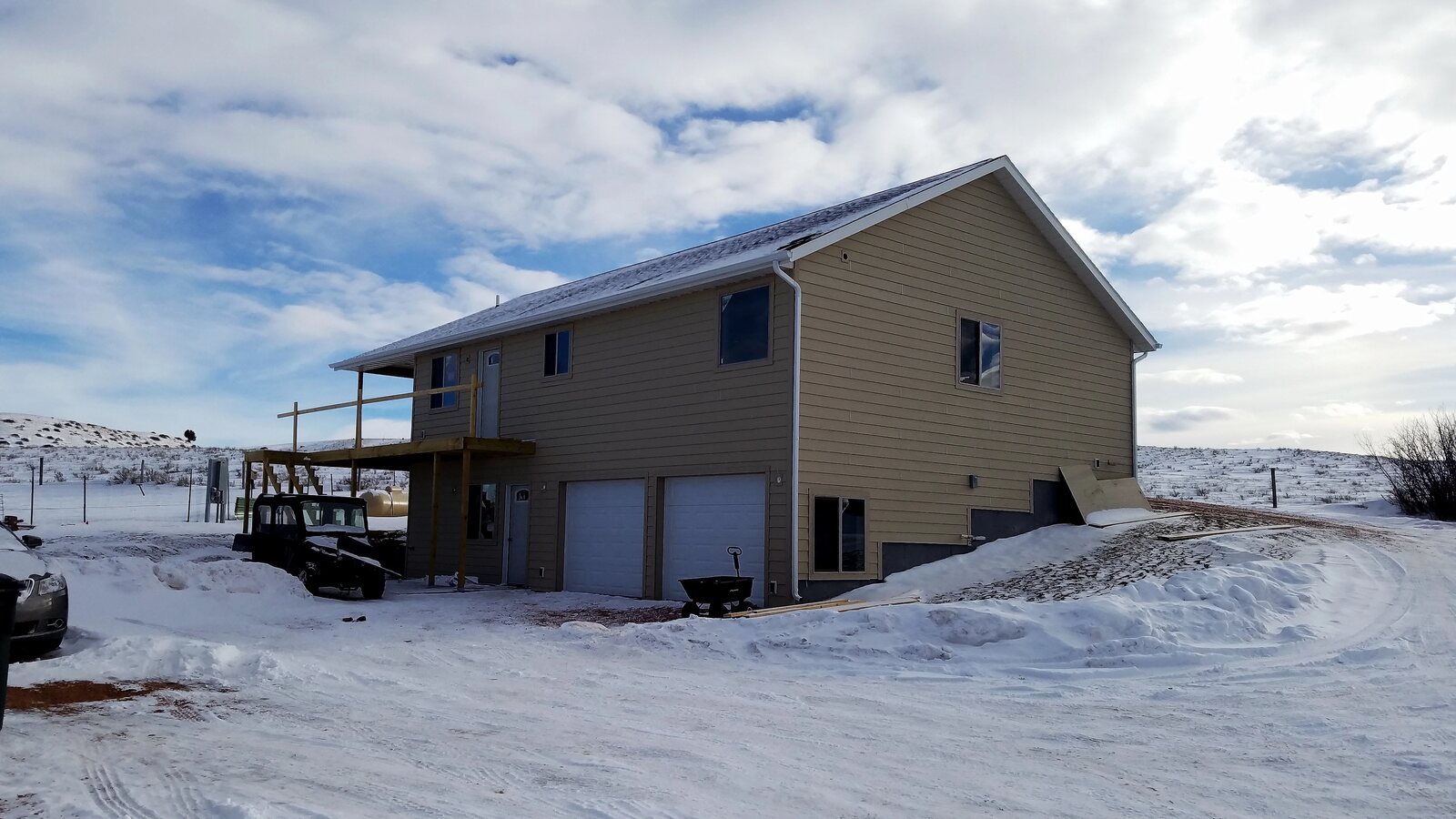 custom home exterior snow in wyoming