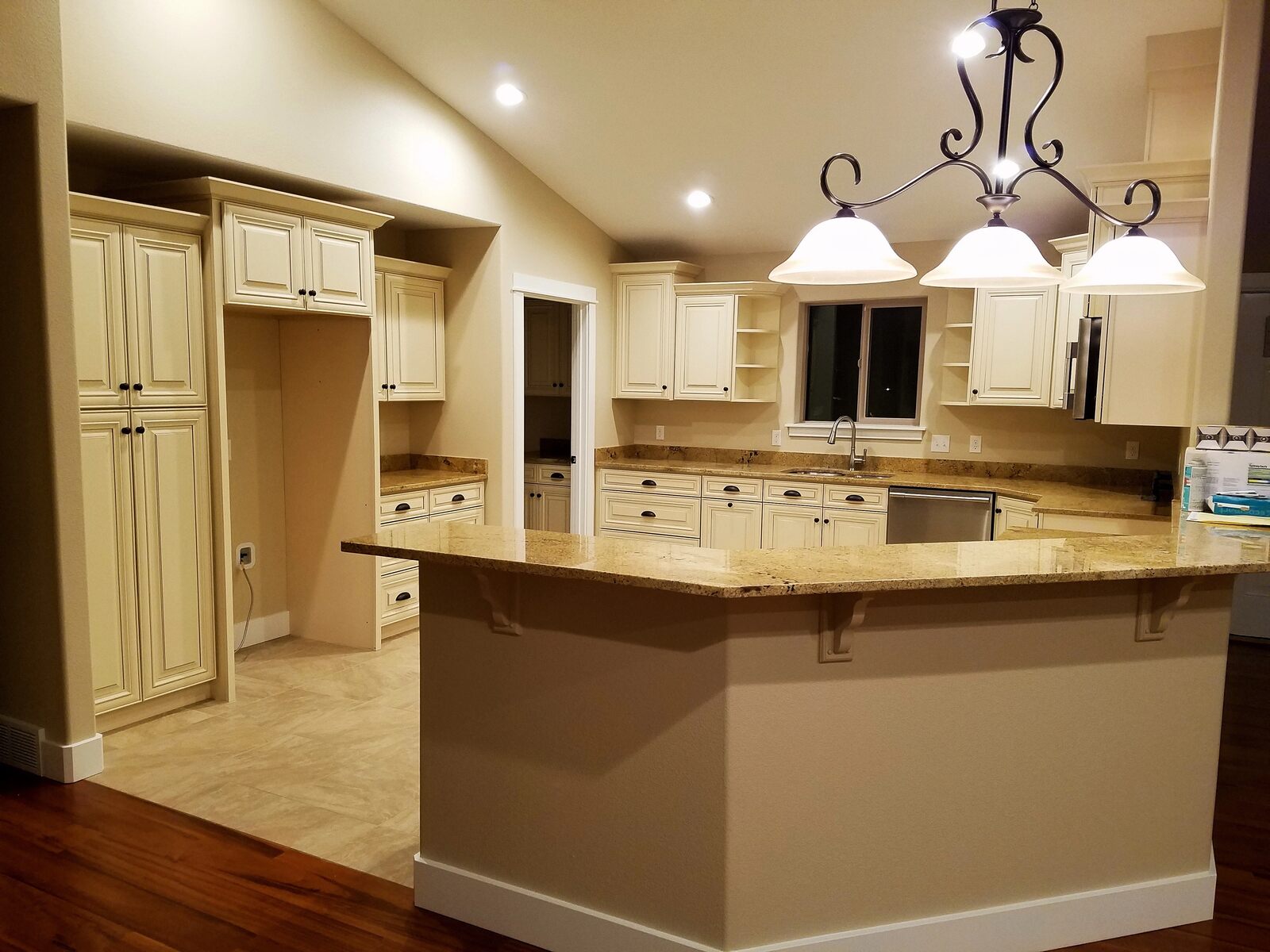 custom home kitchen with pendant lighting in wyoming