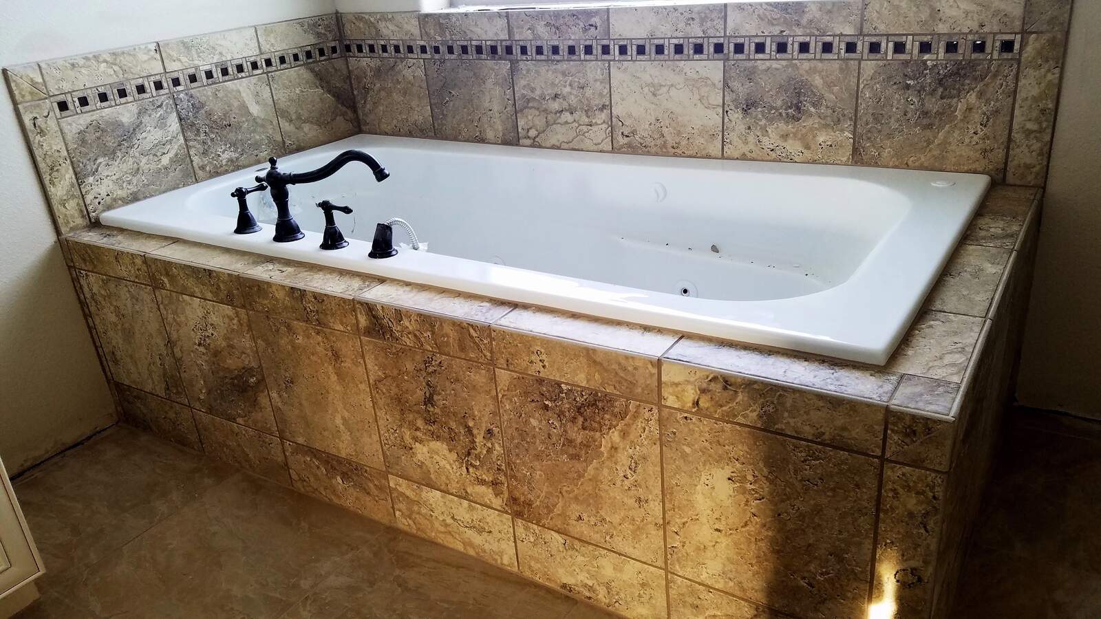 tiled bath tub in custom home in wyoming