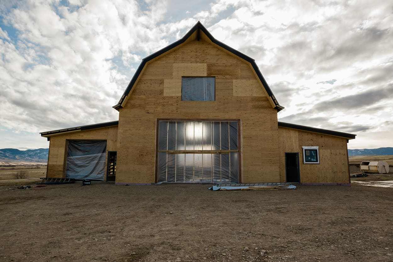 Construction of barn in progress view of front exterior