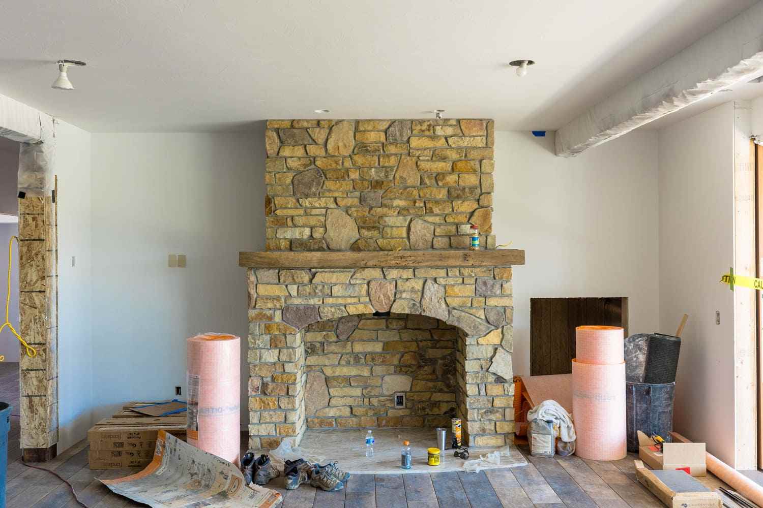 Custom stone fireplace installation in custom home build