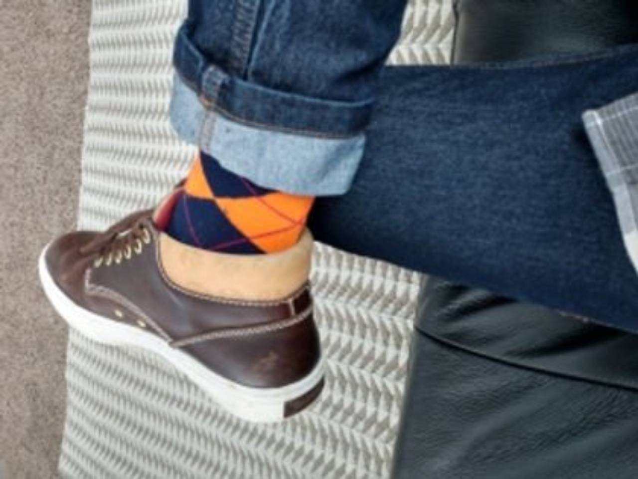 Person Wearing Socks Showing Under Jeans