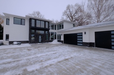 black-and-white-custom-home-interior-with-two-attached-garages-1-1