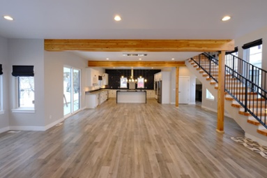 front-view-of-kitchen-in-open-concept-new-home-with-wood-ceiling-beams-1