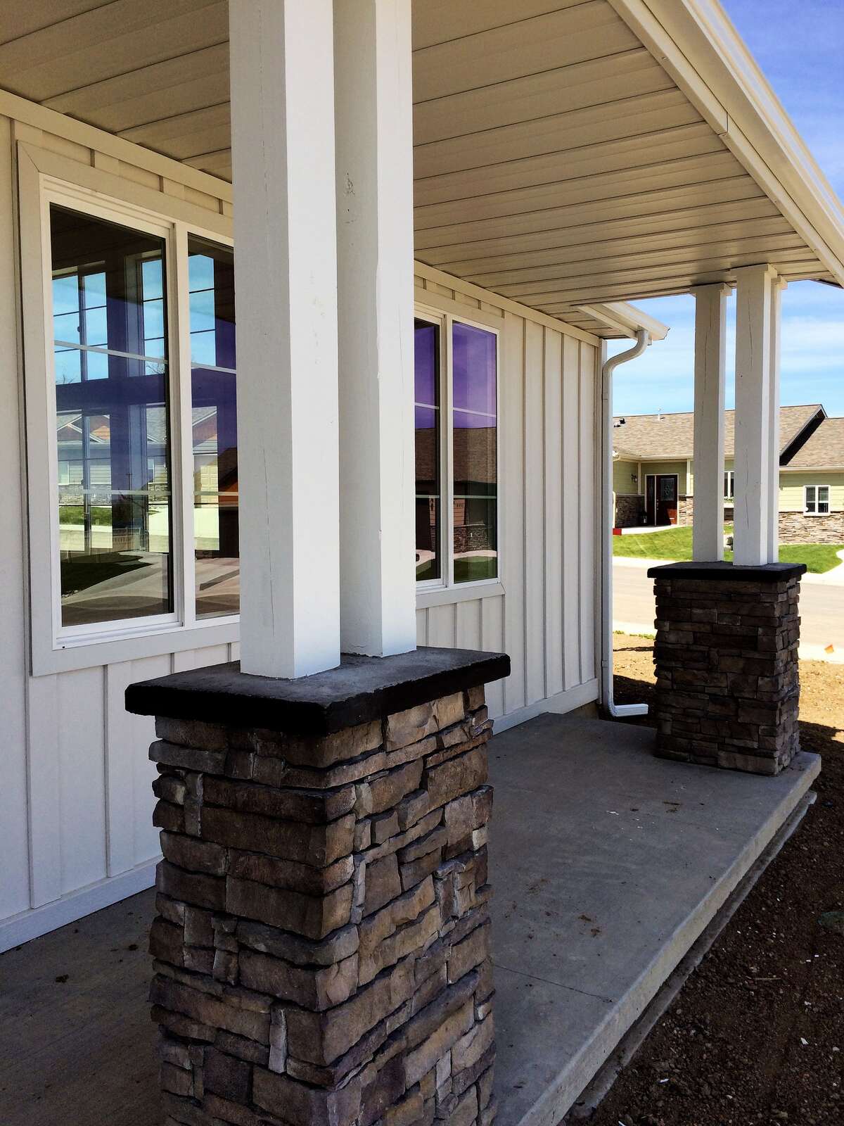 custom home exterior pillars on porch in wyoming