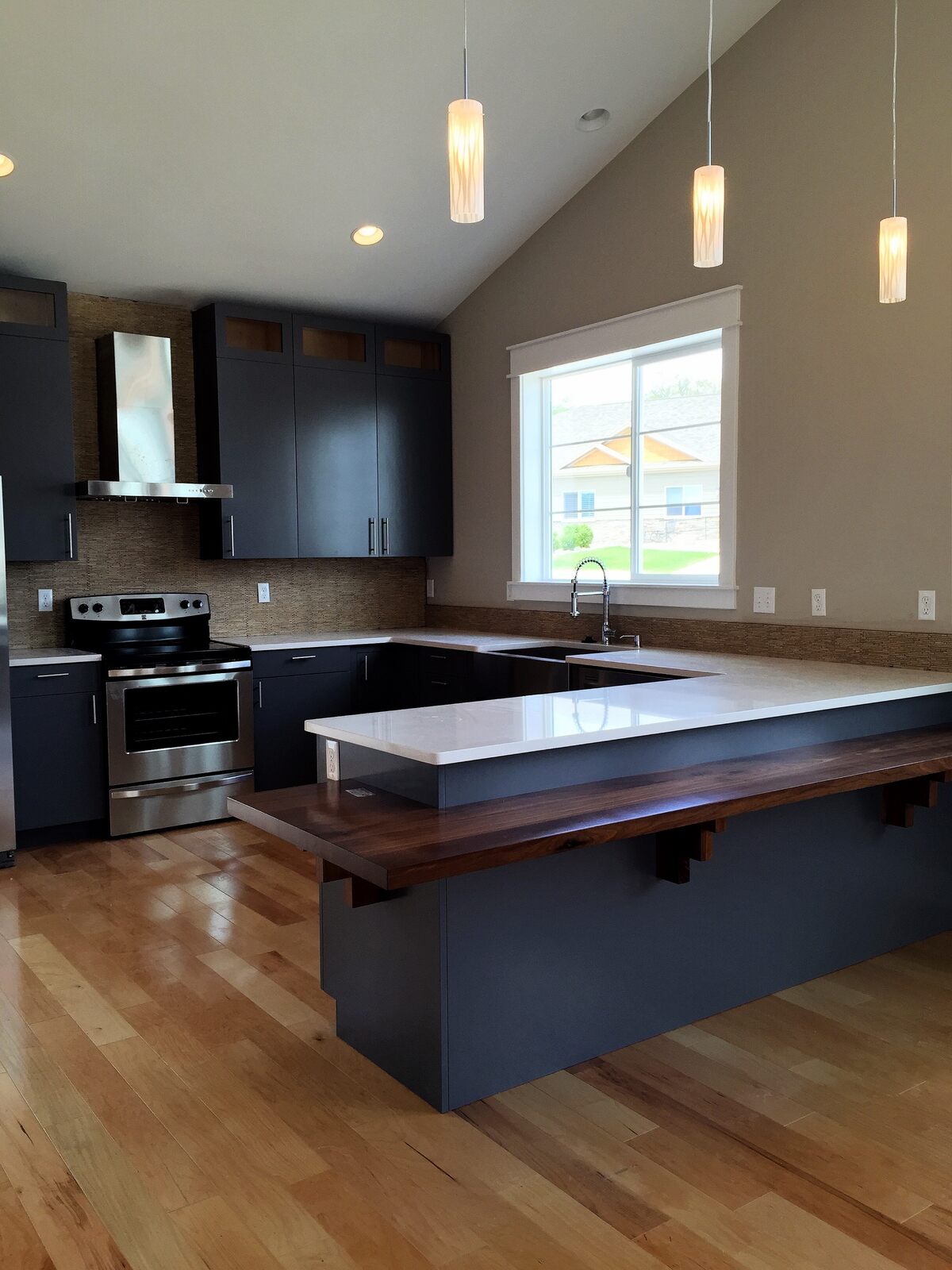 custom home kitchen with u countertop island in wyoming