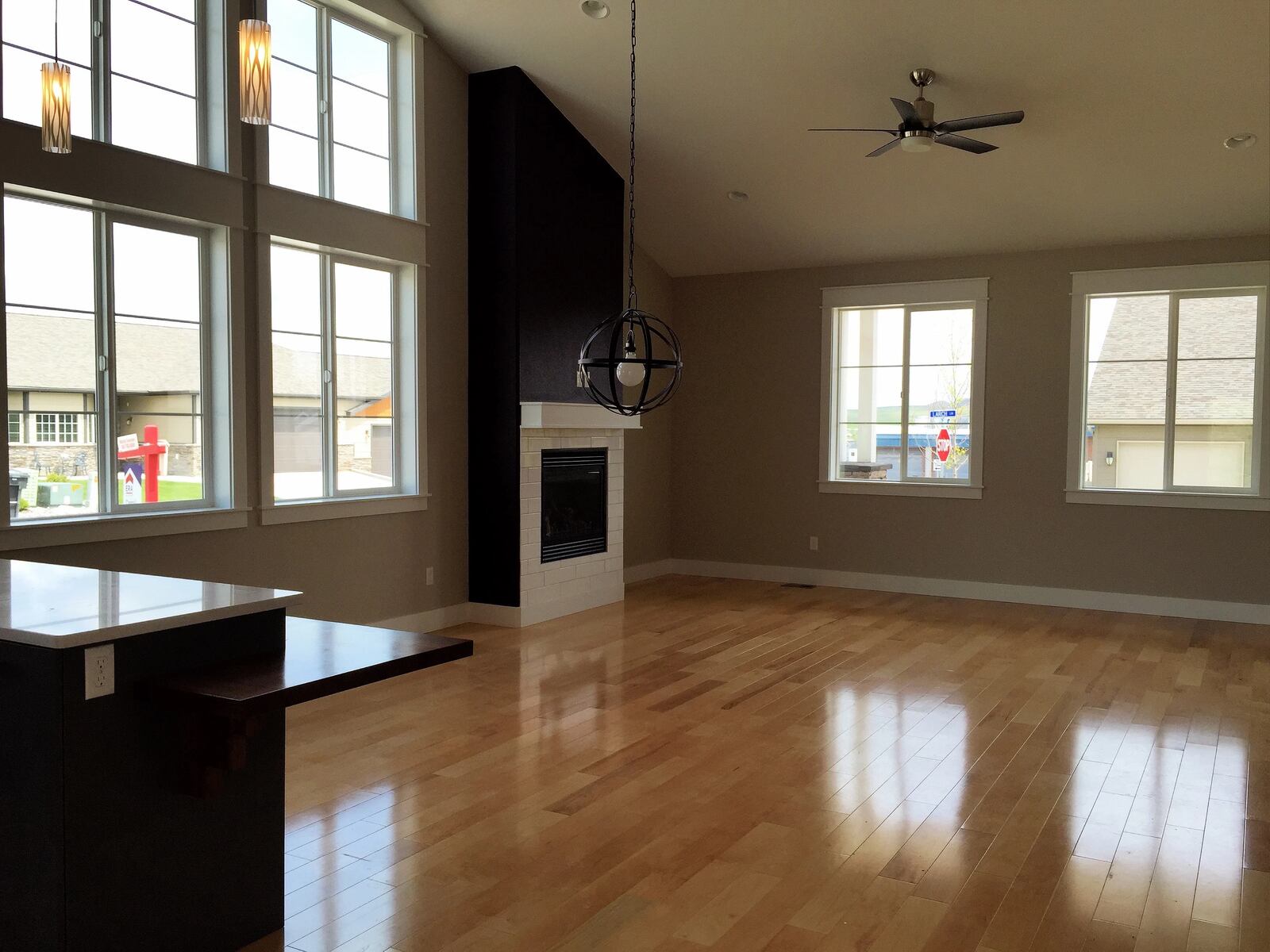 custom home living room wood flooring and windows in wyoming