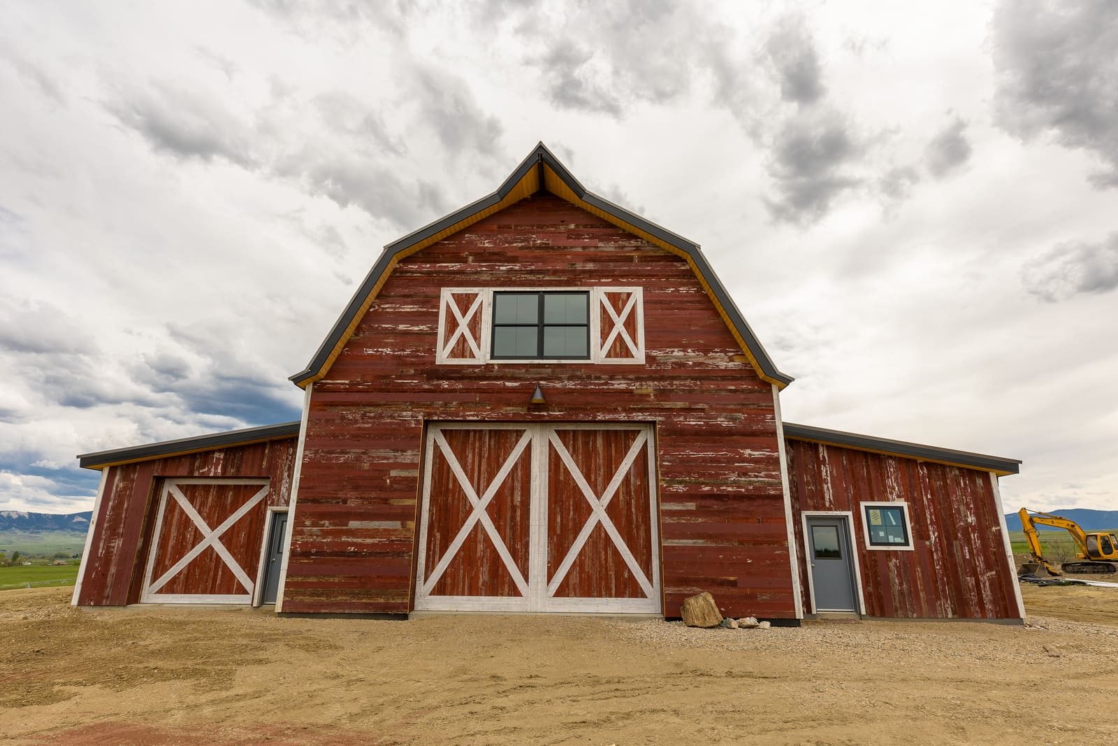 Finished custom barn exterior with reclaimed wood