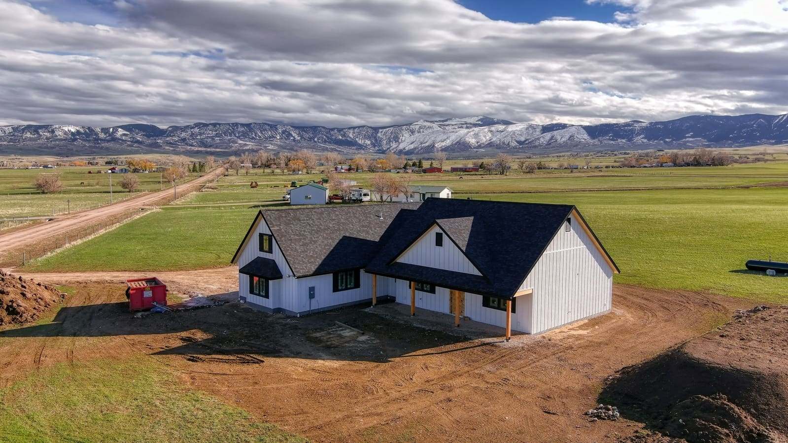 New construction exterior with Wyoming landscape in back off Upper Road