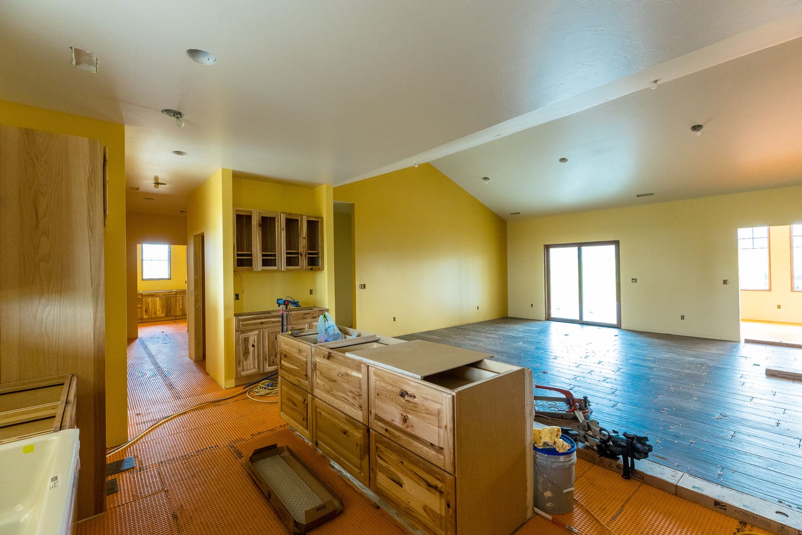 New construction kitchen and living room progress with open-concept layout