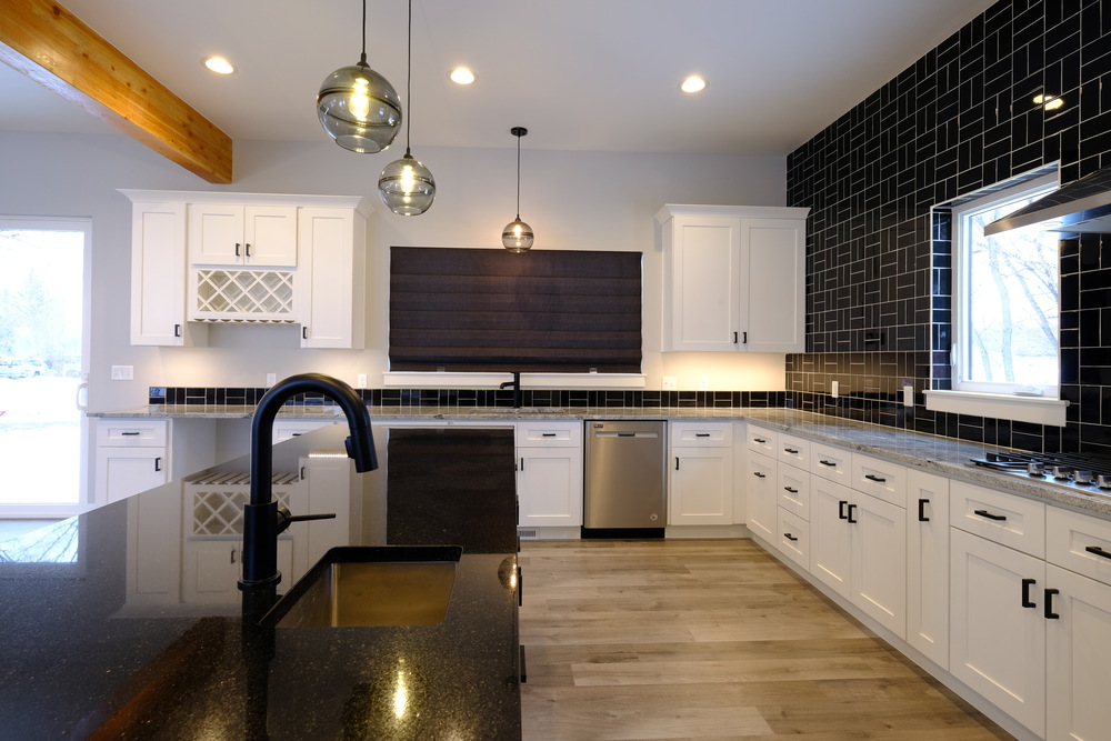 white and black kitchen in custom home in wyoming